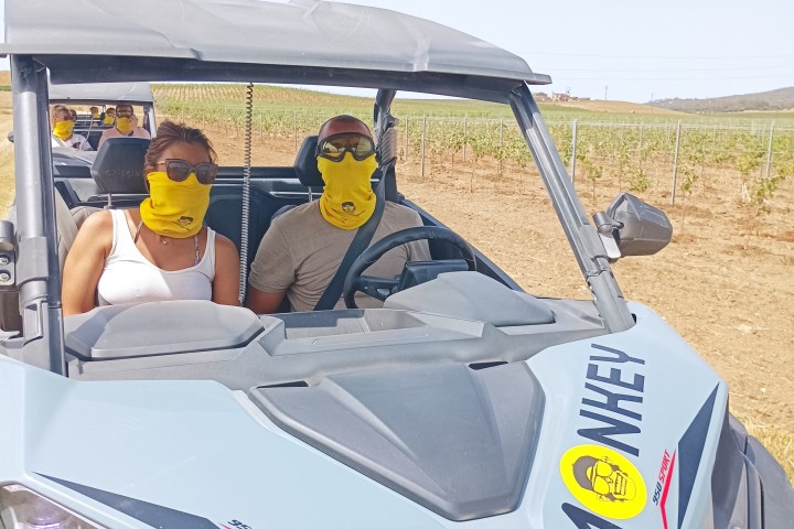 a car that is sitting on a motorcycle