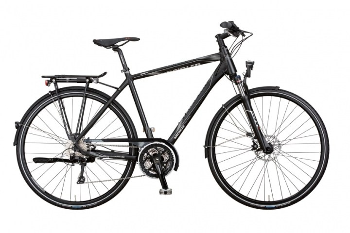 a bicycle leaning against a wall