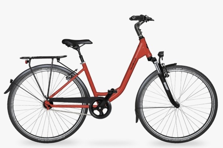 a bicycle leaning against a wall